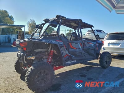 Czwarte zdjęcie samochodu z boku: 2018 POLARIS RZR XP 4 1000 EPS RIDE COMMAND EDITION VIN:3NSVFK991JF416142 - miniatura
