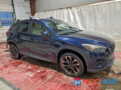 Czwarte zdjęcie samochodu z boku: 2016 MAZDA CX-5 GT VIN:JM3KE4DY3G0695058 - miniatura