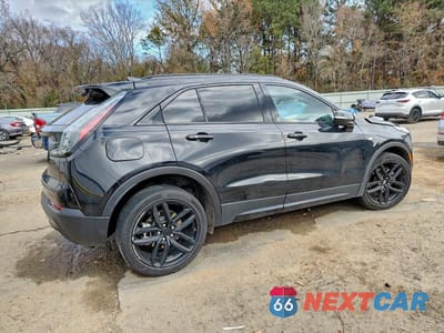 Trzecie zdjęcie samochodu z tyłu: 2023 CADILLAC XT4 SPORT VIN:1GYFZER46PF100480 - miniatura