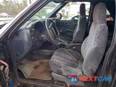 Zdjęcie 7 z 11 samochodu: 2001 GMC JIMMY VIN:1GKCS18W31K172328 - miniatura