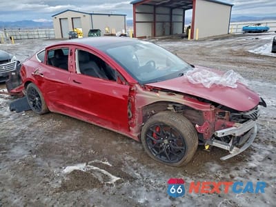 Czwarte zdjęcie samochodu z boku: 2018 TESLA MODEL 3 VIN:5YJ3E1EB7JF072850 - miniatura