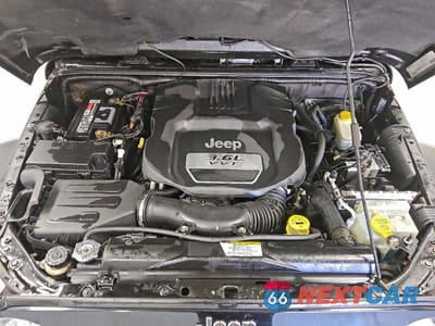 Zdjęcie 11 z 13 samochodu: 2012 JEEP WRANGLER UNLIMITED SAHARA VIN:1C4HJWEG7CL113939 - miniatura