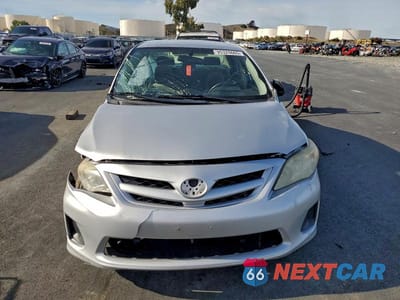 Piąte zdjęcie samochodu w środku: 2011 TOYOTA COROLLA BASE VIN:JTDBU4EE4B9142682 - miniatura