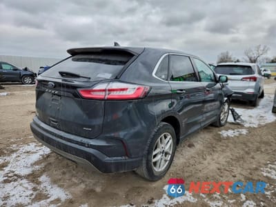 Trzecie zdjęcie samochodu z tyłu: 2021 FORD EDGE SEL VIN:2FMPK4J9XMBA19782 - miniatura