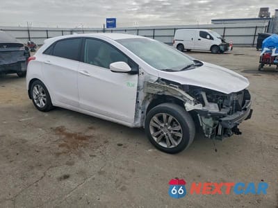Czwarte zdjęcie samochodu z boku: 2013 HYUNDAI ELANTRA GT VIN:KMHD35LE2DU092221 - miniatura