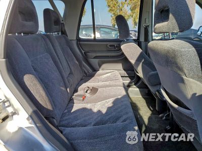 Zdjęcie 11 z 14 samochodu: 1999 HONDA CR-V LX VIN:JHLRD1847XC063777 - miniatura