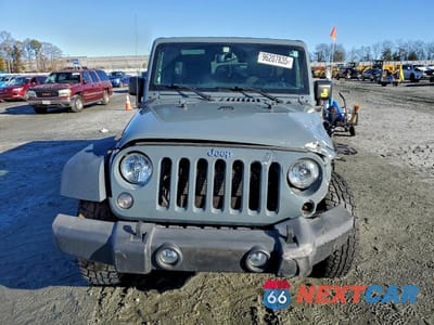 Piąte zdjęcie samochodu w środku: 2015 JEEP WRANGLER UNLIMITED SPORT VIN:1C4BJWDG2FL622509 - miniatura