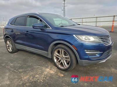 Czwarte zdjęcie samochodu z boku: 2015 LINCOLN MKC VIN:5LMTJ2AH5FUJ10241 - miniatura
