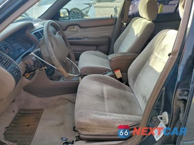 Zdjęcie 7 z 15 samochodu: 1996 TOYOTA COROLLA DX VIN:1NXBB02E5TZ463496 - miniatura