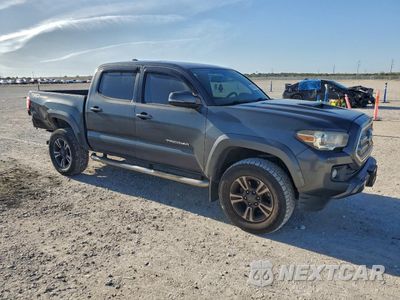 Czwarte zdjęcie samochodu z boku: 2016 TOYOTA TACOMA DOUBLE CAB VIN:3TMAZ5CN0GM015569 - miniatura