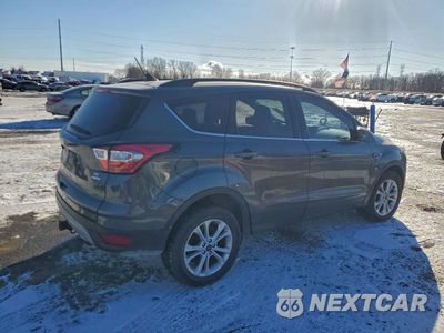 Trzecie zdjęcie samochodu z tyłu: 2018 FORD ESCAPE SE VIN:1FMCU0GD8JUB09192 - miniatura