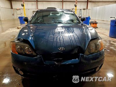 Piąte zdjęcie samochodu w środku: 2003 HYUNDAI TIBURON GT VIN:KMHHN65F13U029035 - miniatura