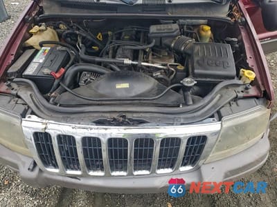 Zdjęcie 12 z 13 samochodu: 2003 JEEP GRAND CHEROKEE LAREDO VIN:1J8GW48S93C556717 - miniatura