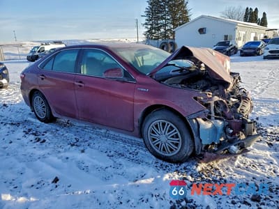 Czwarte zdjęcie samochodu z boku: 2016 TOYOTA CAMRY HYBRID VIN:4T1BD1FK5GU186340 - miniatura