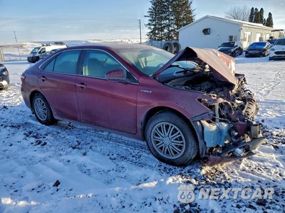 Czwarte zdjęcie samochodu z boku: 2016 TOYOTA CAMRY HYBRID VIN:4T1BD1FK5GU186340 - miniatura