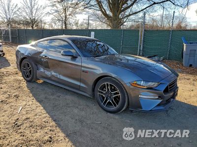 Czwarte zdjęcie samochodu z boku: 2021 FORD MUSTANG VIN:1FA6P8TH3M5113140 - miniatura