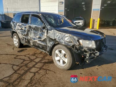 Czwarte zdjęcie samochodu z boku: 2012 JEEP GRAND CHEROKEE LAREDO VIN:1C4RJFAG3CC111440 - miniatura