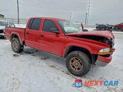 Czwarte zdjęcie samochodu z boku: 2003 DODGE DAKOTA QUAD SLT VIN:1D7HG48N23S105739 - miniatura