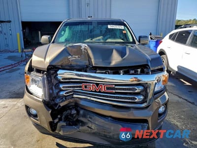 Piąte zdjęcie samochodu w środku: 2015 GMC CANYON SLE VIN:1GTH5BE32F1222187 - miniatura