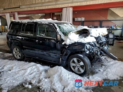 Czwarte zdjęcie samochodu z boku: 2014 JEEP PATRIOT VIN:1C4NJRFB2ED616928 - miniatura
