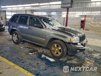 Czwarte zdjęcie samochodu z boku: 2007 JEEP GRAND CHEROKEE LAREDO VIN:1J8GR48K37C597244 - miniatura