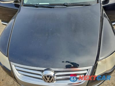 Zdjęcie 12 z 14 samochodu: 2010 VOLKSWAGEN TOUAREG 2 VIN:WVGFK7A94AD004228 - miniatura