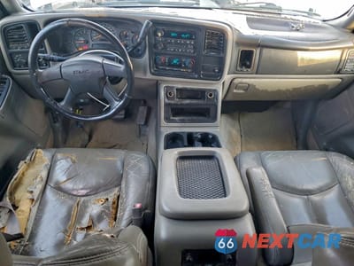 Zdjęcie 8 z 13 samochodu: 2004 GMC YUKON VIN:1GKEC13Z34J219259 - miniatura