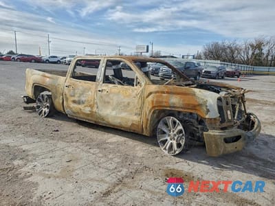 Czwarte zdjęcie samochodu z boku: 2018 GMC SIERRA K1500 DENALI VIN:3GTU2PEJXJG180591 - miniatura