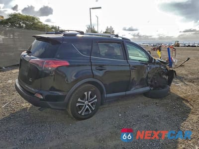 Trzecie zdjęcie samochodu z tyłu: 2018 TOYOTA RAV4 LE VIN:2T3BFREV6JW756882 - miniatura