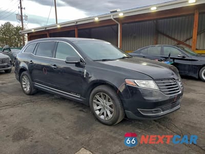 Czwarte zdjęcie samochodu z boku: 2017 LINCOLN TOWNHOUSE MKT VIN:2LMHJ5NK7HBL01642 - miniatura