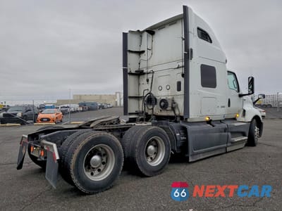Czwarte zdjęcie samochodu z boku: 2021 INTERNATIONAL LT625 SEMI TRUCK VIN:3HSDZAPR4MN292368 - miniatura