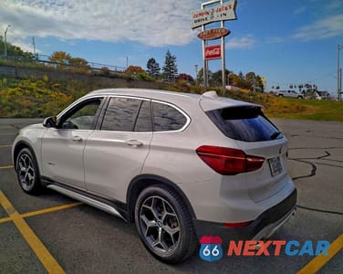 Trzecie zdjęcie samochodu z tyłu: 2016 BMW X1 XDRIVE28I VIN:WBXHT3C3XGP880243 - miniatura