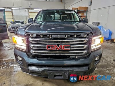 Piąte zdjęcie samochodu w środku: 2017 GMC CANYON SLE VIN:1GTG6CEN5H1269510 - miniatura
