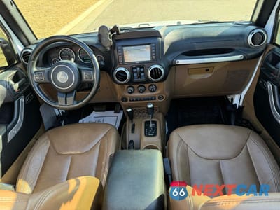 Zdjęcie 9 z 10 samochodu: 2015 JEEP WRANGLER UNLIMITED SAHARA VIN:1C4BJWEG9FL646451 - miniatura