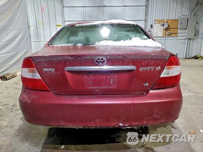 Zdjęcie 6 z 11 samochodu: 2003 TOYOTA CAMRY LE VIN:4T1BF32K83U040875 - miniatura