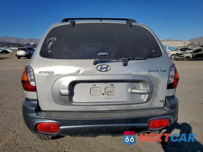 Zdjęcie 6 z 15 samochodu: 2002 HYUNDAI SANTA FE GLS VIN:KM8SC13D22U143687 - miniatura