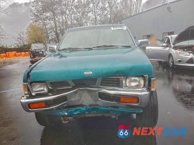 Piąte zdjęcie samochodu w środku: 1995 NISSAN TRUCK KING CAB SE VIN:1N6HD16Y4SC458228 - miniatura