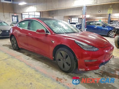 Czwarte zdjęcie samochodu z boku: 2019 TESLA MODEL 3 VIN:5YJ3E1EAXKF484561 - miniatura