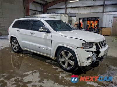 Czwarte zdjęcie samochodu z boku: 2016 JEEP GRAND CHEROKEE OVERLAND VIN:1C4RJFCT2GC319261 - miniatura