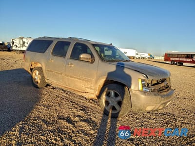 Czwarte zdjęcie samochodu z boku: 2007 CHEVROLET SUBURBAN K1500 VIN:1GNFK16307J175503 - miniatura