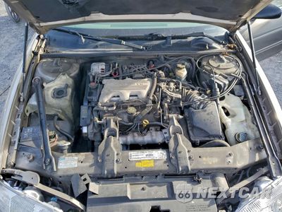 Zdjęcie 11 z 12 samochodu: 1999 CHEVROLET LUMINA BASE VIN:2G1WL52MXX9203128 - miniatura