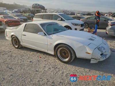 Czwarte zdjęcie samochodu z boku: 1991 PONTIAC FIREBIRD TRANS AM VIN:1G2FW2384ML211992 - miniatura
