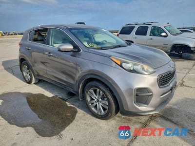 Czwarte zdjęcie samochodu z boku: 2017 KIA SPORTAGE LX VIN:KNDPM3ACXH7134594 - miniatura