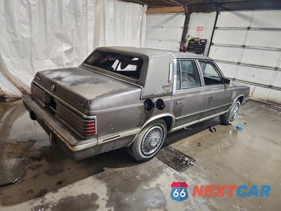 Trzecie zdjęcie samochodu z tyłu: 1984 CHRYSLER NEW YORKER VIN:1C3BT56GXEC155750 - miniatura