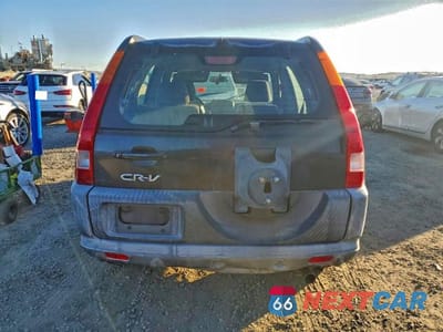 Zdjęcie 6 z 13 samochodu: 2004 HONDA CR-V LX VIN:JHLRD68404C023999 - miniatura