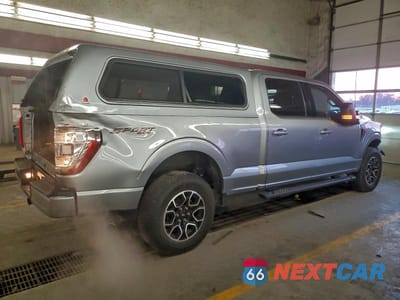 Trzecie zdjęcie samochodu z tyłu: 2023 FORD F150 SUPERCREW VIN:1FTFW1E83PFA77787 - miniatura