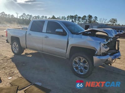 Czwarte zdjęcie samochodu z boku: 2018 CHEVROLET SILVERADO K1500 LT VIN:3GCUKREC1JG514620 - miniatura