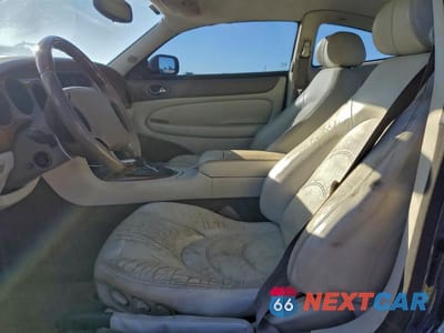 Zdjęcie 7 z 11 samochodu: 2001 JAGUAR XKR VIN:SAJDA41B71PA15016 - miniatura