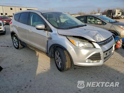 Czwarte zdjęcie samochodu z boku: 2016 FORD ESCAPE SE VIN:1FMCU0G79GUC78916 - miniatura