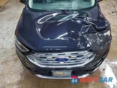 Zdjęcie 12 z 13 samochodu: 2019 FORD EDGE TITANIUM VIN:2FMPK4K99KBB58555 - miniatura
